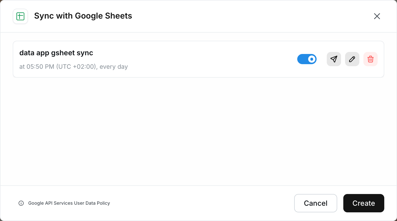 The Sync with Google Sheets modal for a data app, listing an existing daily sync
