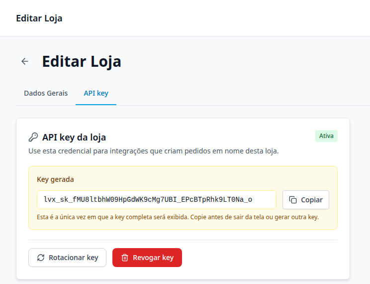 Aba API key de uma loja, com a key gerada, o botão Copiar e as ações Rotacionar key e Revogar key