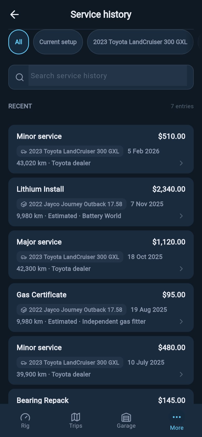 Service history list with tow vehicle and caravan records shown together in date order.