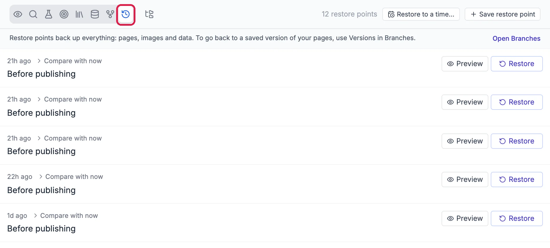 The Project history panel listing restore points, each with Compare with now, Preview and Restore, and the clock icon outlined