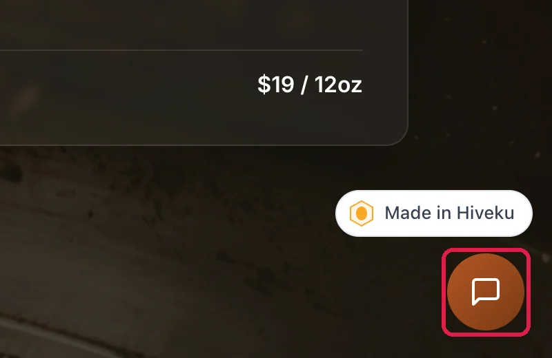 The bottom-right corner of the Northwind site: the Made in Hiveku badge, and below it the round orange chat button, outlined