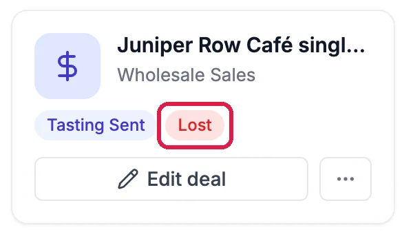 The deal's header: Juniper Row Café single-origin rotation, Wholesale Sales, the Tasting Sent tag, and the Lost tag outlined, above Edit deal