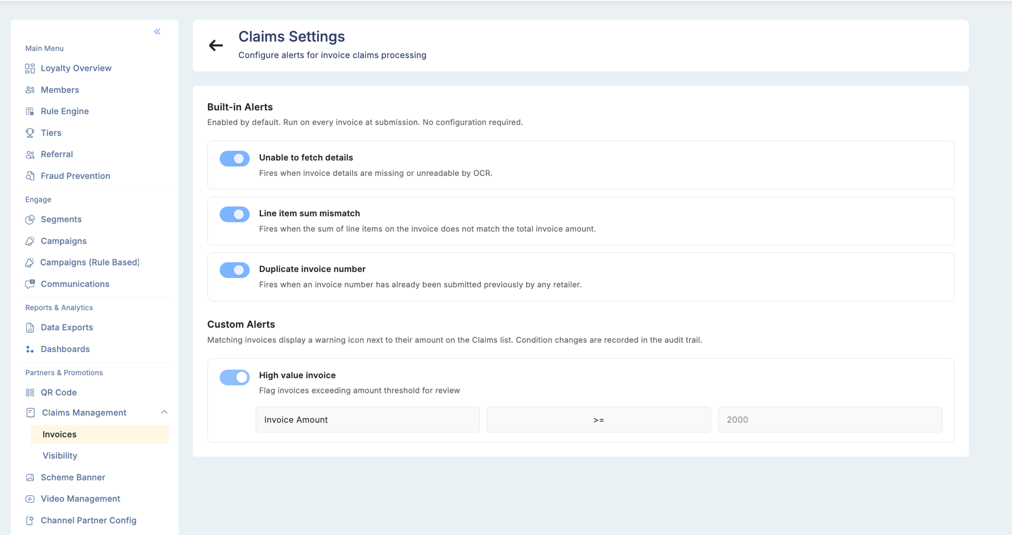 Claims Settings screen showing Built-in Alerts section with toggles for Unable to fetch details, Line item sum mismatch, and Duplicate invoice number checks, plus Custom Alerts section with a High value invoice rule configured to flag invoices with Amount >= 2000
