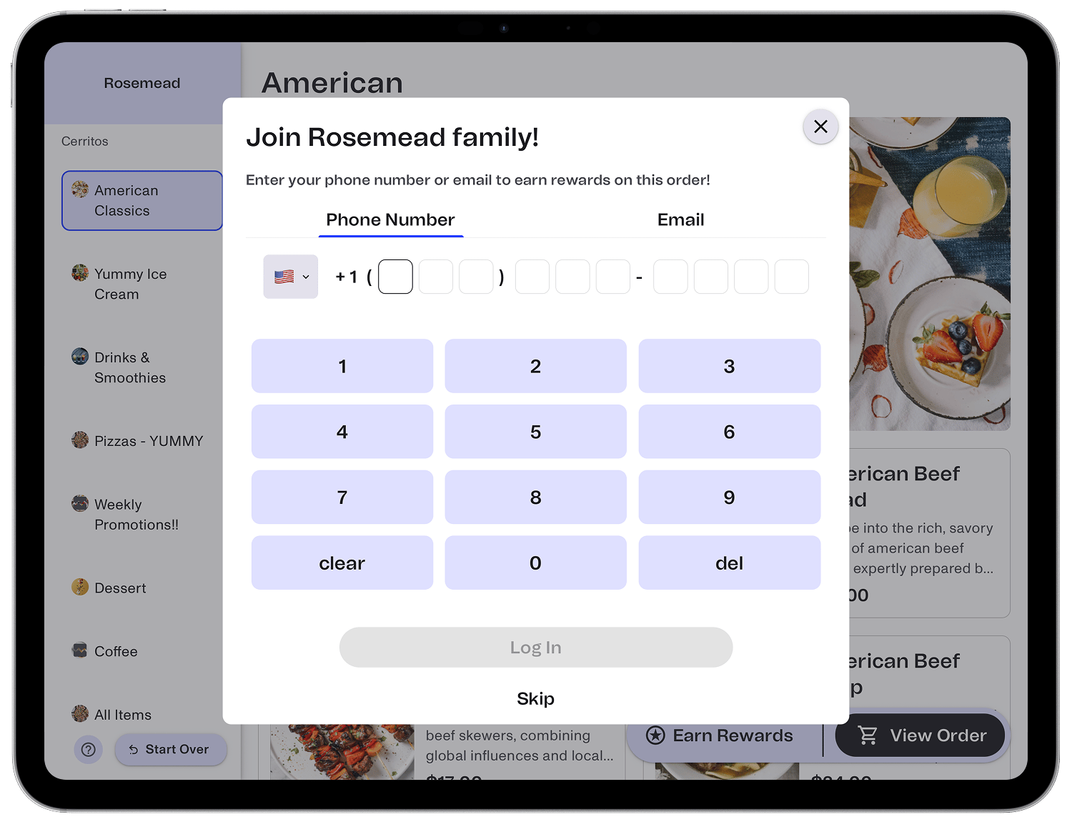 Prominent loyalty sign-in and sign-up prompt at the start of a kiosk order