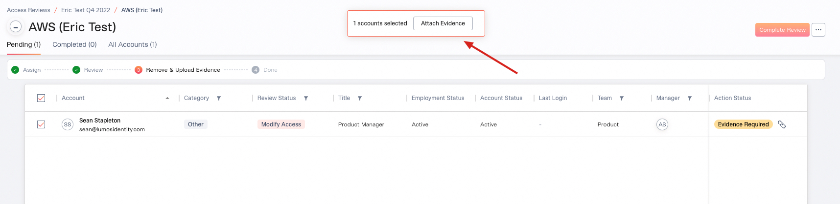 An account selected with its checkbox, and the bulk action bar showing the button for attaching evidence