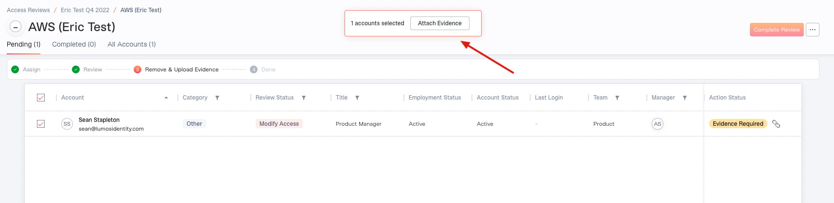 An account selected with its checkbox, and the bulk action bar showing the button for attaching evidence