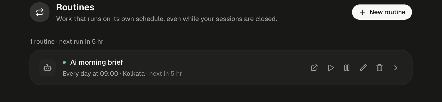 The Routines page. Beside a circular-arrows icon, the header reads Routines, with the subtitle Work that runs on its own schedule, even while your sessions are closed, and a New routine button with a plus icon on the right. The summary line reads 1 routine · next run in 5 hr. One row follows: a bot icon, a green dot, the name Ai morning brief and the timetable Every day at 09:00 · Kolkata · next in 5 hr. The row ends with six icon buttons: View session, Run now, Pause, Edit, Remove and Expand.