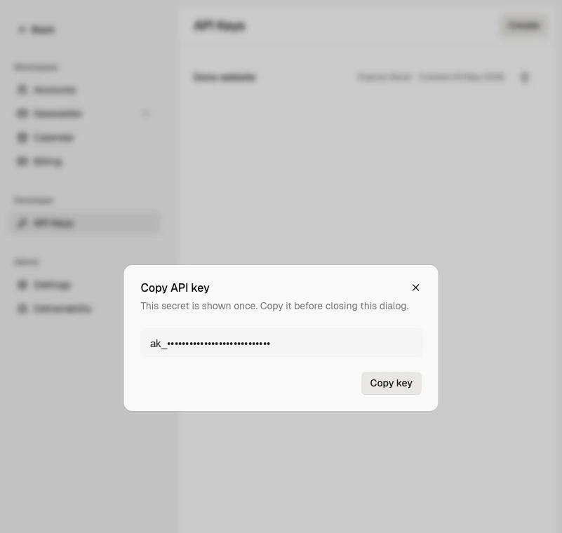 Copy API key dialog with the API key redacted