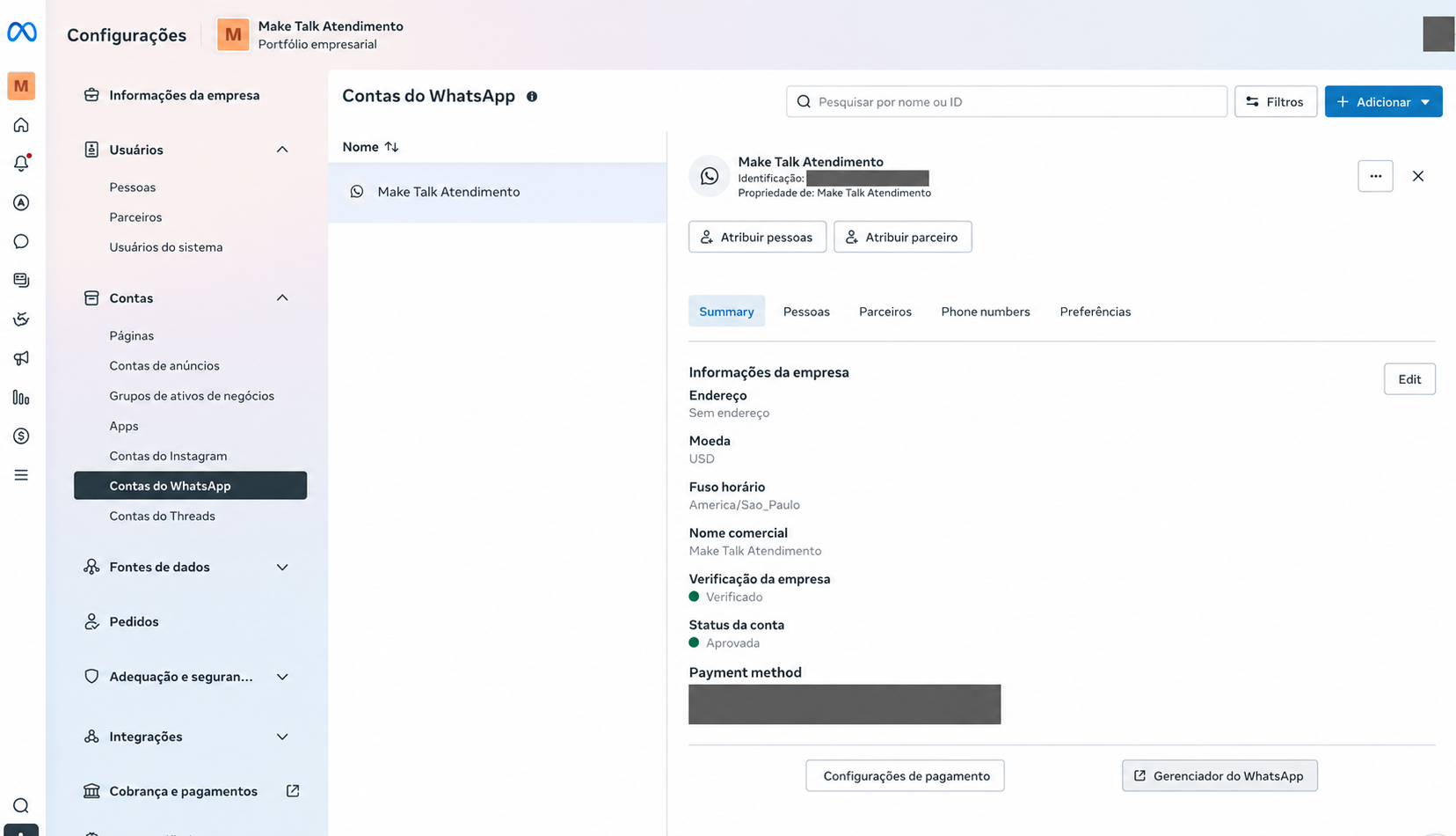 Configurações da Meta com Contas do WhatsApp selecionado e botão Gerenciador do WhatsApp na parte inferior direita; identificação, pagamento e foto de perfil ocultados