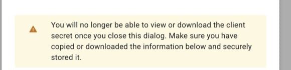 Google's warning that the client secret cannot be viewed again once the dialog is closed