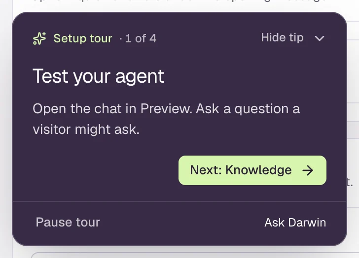 The Setup tour card, step 1 of 4: Test your agent. Open the chat in Preview and ask a question a visitor might ask. Buttons for Next: Knowledge, Pause tour and Ask Darwin.