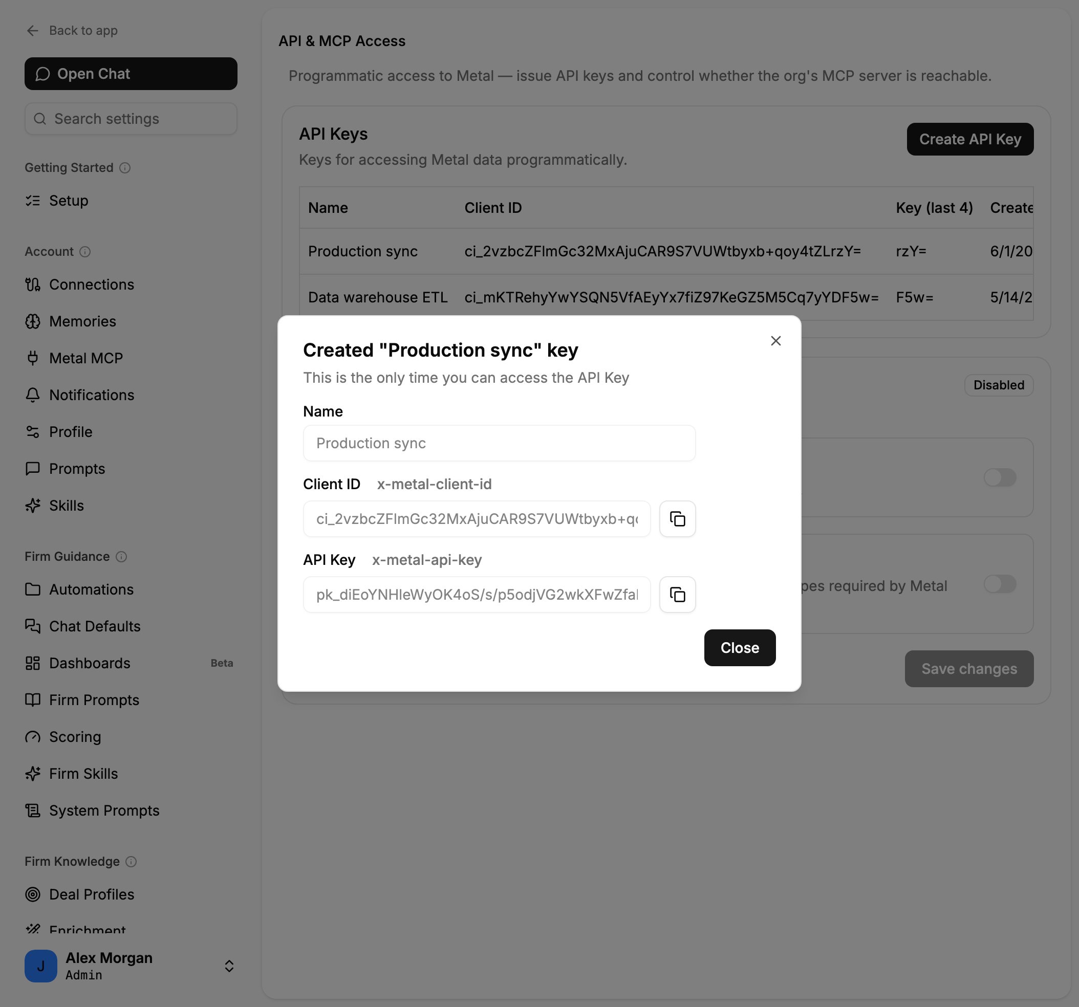 Created key dialog displaying the Client ID and API Key values with copy buttons