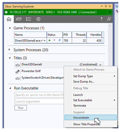 Visual Studio 中 XBOX Gaming Explorer 的截图，突出显示当前主机上处于 Constrained 状态的某个 title 上下文菜单中的 Unconstrain 菜单项。