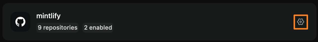 The gear icon next to the organization name in dark mode.