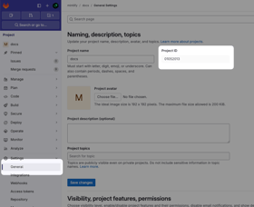 The General Settings page in the GitLab dashboard. The Project ID is highlighted.