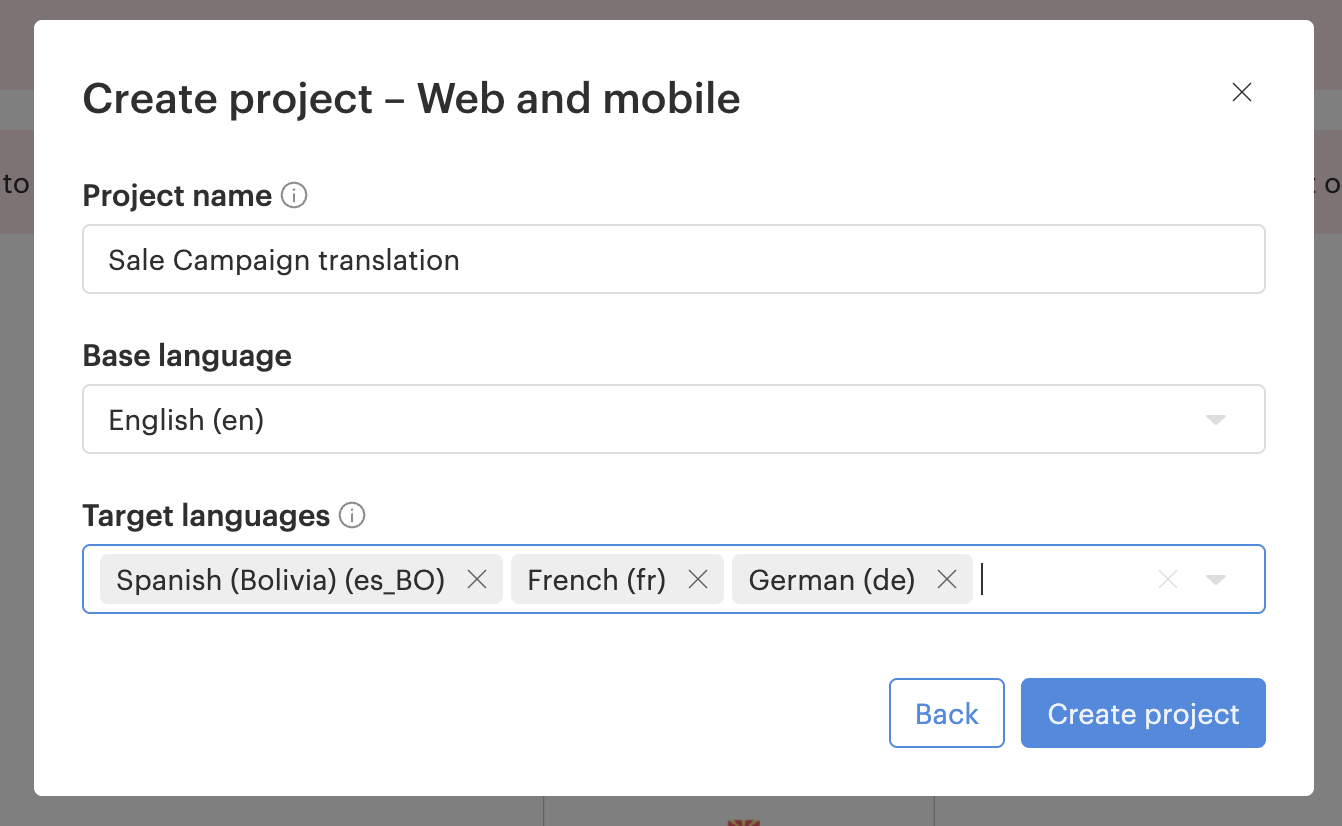 Lokalise New Project dialog with Project Name, Base Language, Target Languages, and Project Type fields filled in