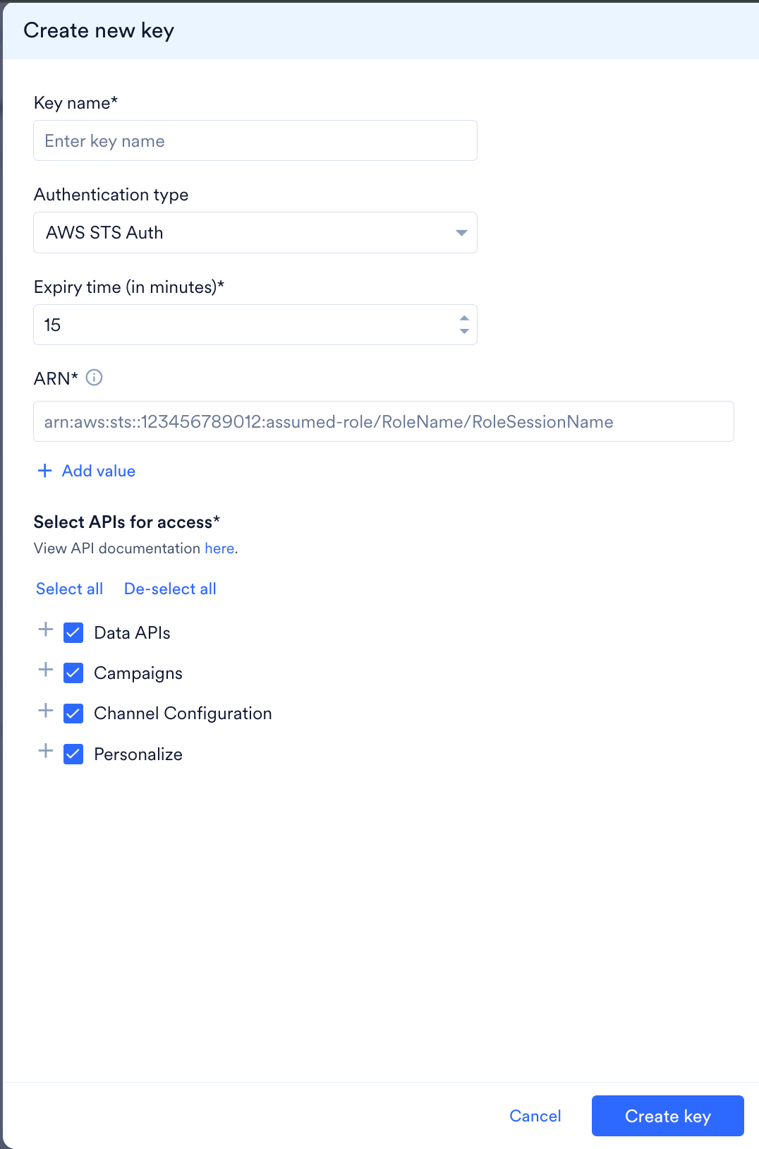 Create new key dialog with Authentication type set to AWS STS Auth, showing the Expiry time in minutes box, the ARN box with its format placeholder, the Add value link, and the Data APIs, Campaigns, Channel Configuration, and Personalize groups under Select APIs for access