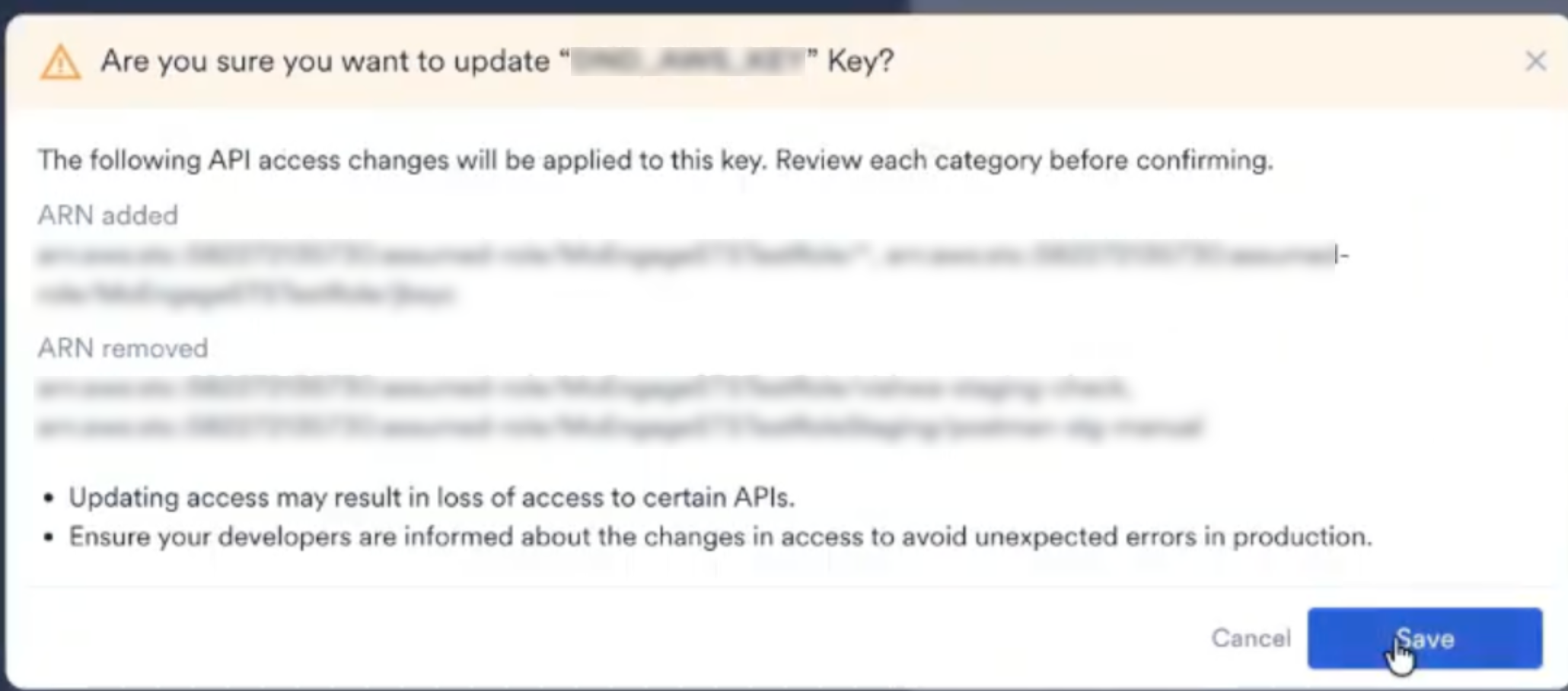 Update confirmation dialog listing the ARNs added and the ARNs removed, with Cancel and Save buttons