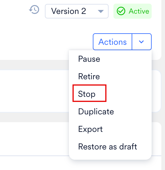 Actions menu with the Stop option highlighted, beside the version selector and the Active status badge