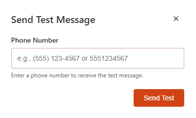 The Send Test Message dialog with a phone number entered