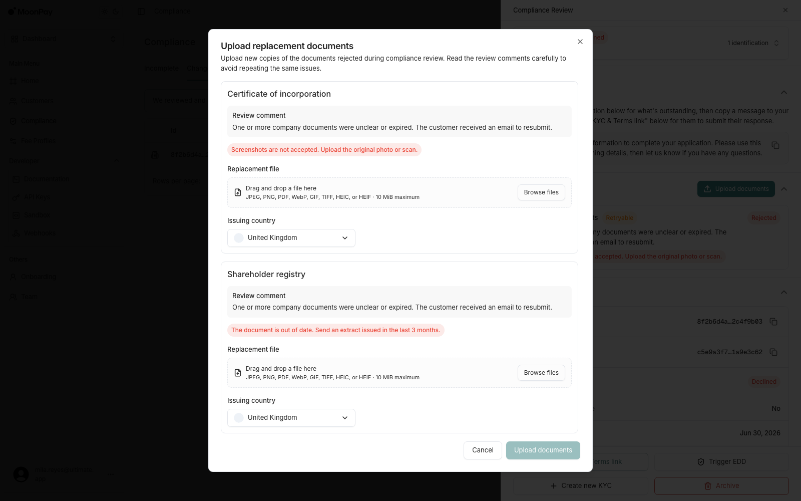 Upload replacement documents dialog listing a certificate of incorporation and a shareholder registry, each with its review comment, a file picker and an issuing country