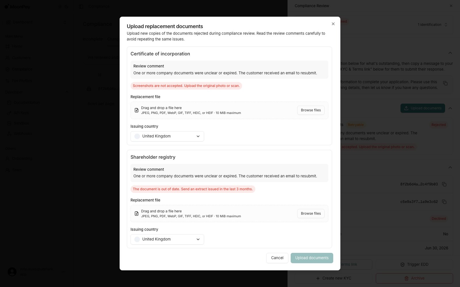 Upload replacement documents dialog listing a certificate of incorporation and a shareholder registry, each with its review comment, a file picker and an issuing country