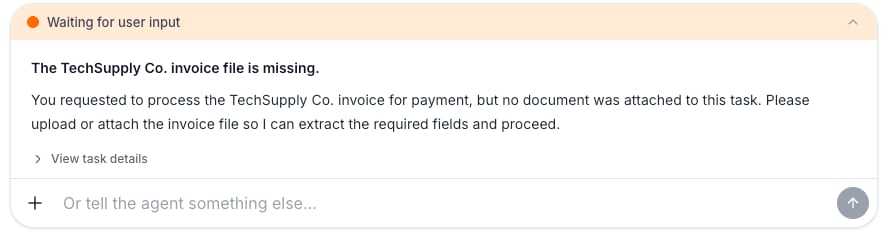 A paused task showing the agent's question and a Waiting for user input prompt