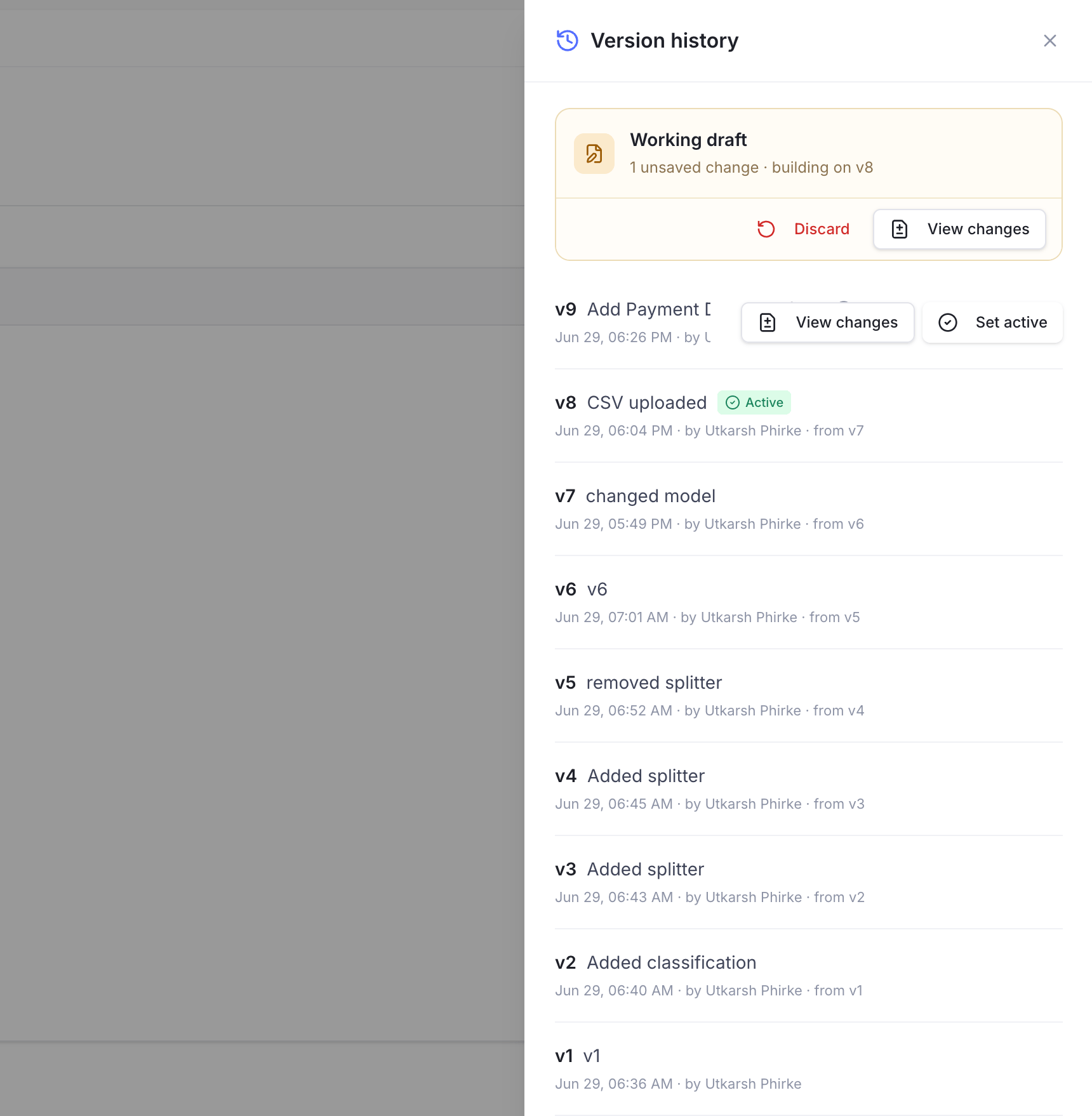 Version history panel showing a working draft, published versions, an Active badge, View changes, Set active, and Discard actions