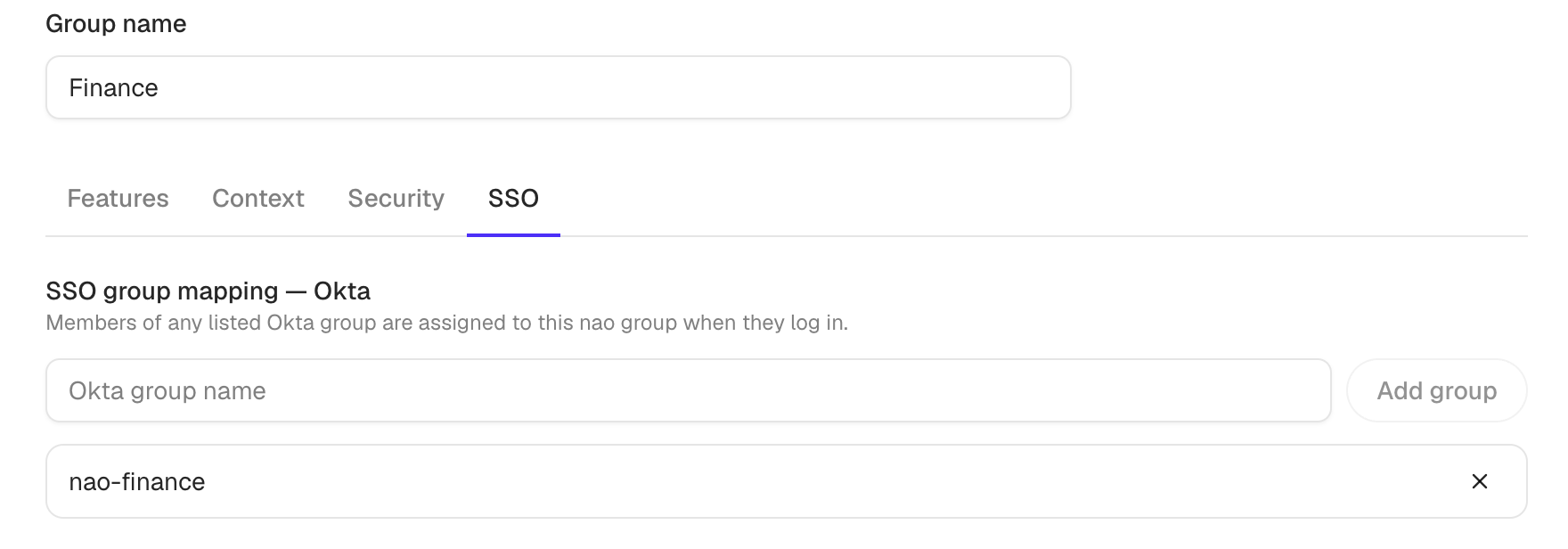 SSO tab mapping an Okta group to the Finance User Group