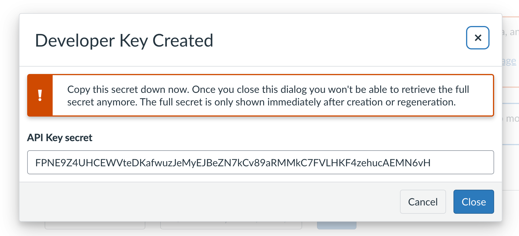 Canvas Developer Key Created dialog warning that the secret is shown only once, with the API Key secret value displayed
