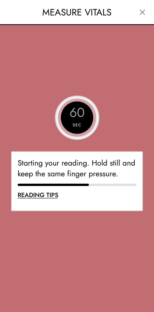 Positioning: the ring at 60 seconds over the camera, and a card that says the reading is starting, with its start bar more than half full