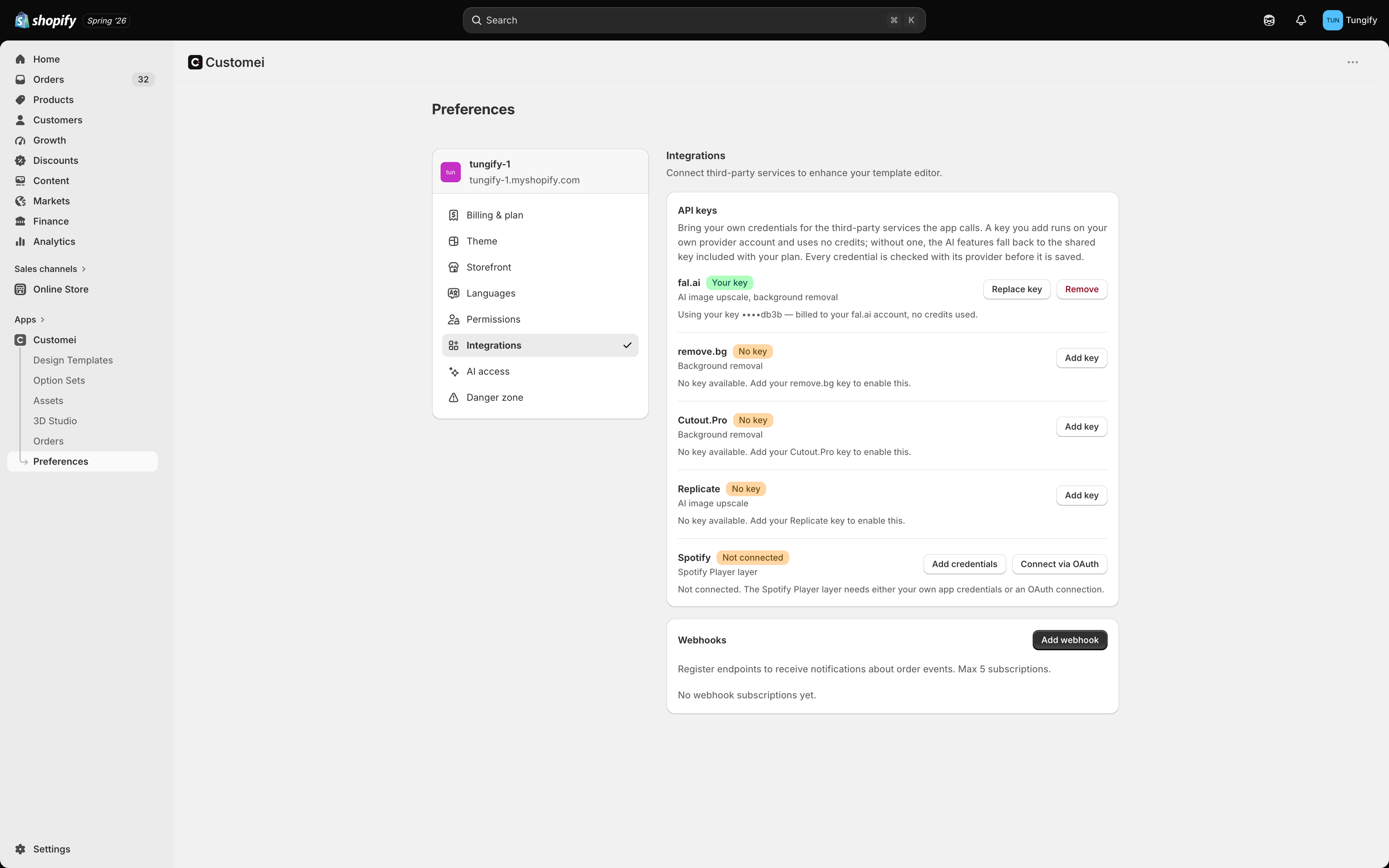 The Integrations tab in Customei preferences showing an API keys card listing fal.ai, remove.bg, Cutout.Pro, Replicate and Spotify, and a Webhooks card below it.
