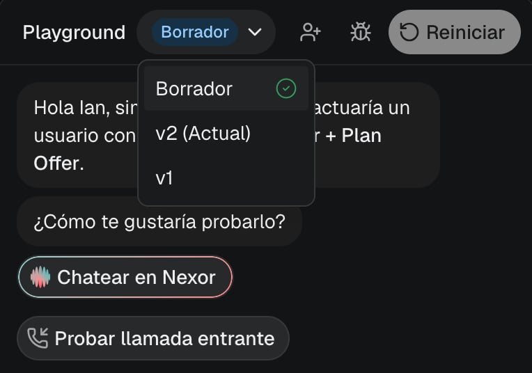 The Playground version selector reading Draft with its menu open: Draft selected, v2 (Current) and v1. Test inbound call appears below the channel options. Shown in the Spanish interface.