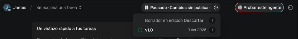 The version history open below the pill: a draft in progress with Discard, and version 1.0 marked as current. Shown in the Spanish interface.