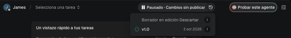 The version history open below the pill: a draft in progress with Discard, and version 1.0 marked as current. Shown in the Spanish interface.