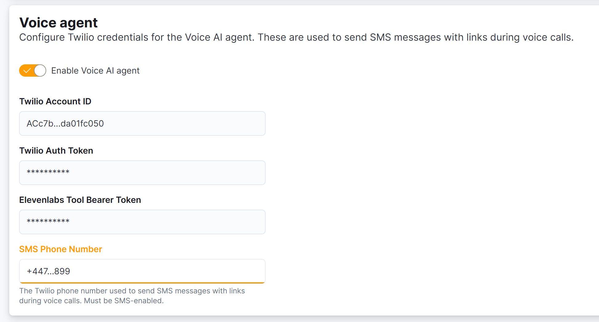 AI settings in Nexudus showing the AI Voice toggle, Twilio credentials fields, and the Voice phone number field