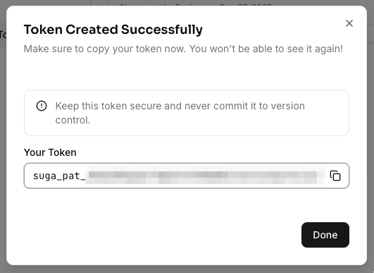 Token created modal displaying the newly generated personal access token with a copy button and warning that it will only be shown once