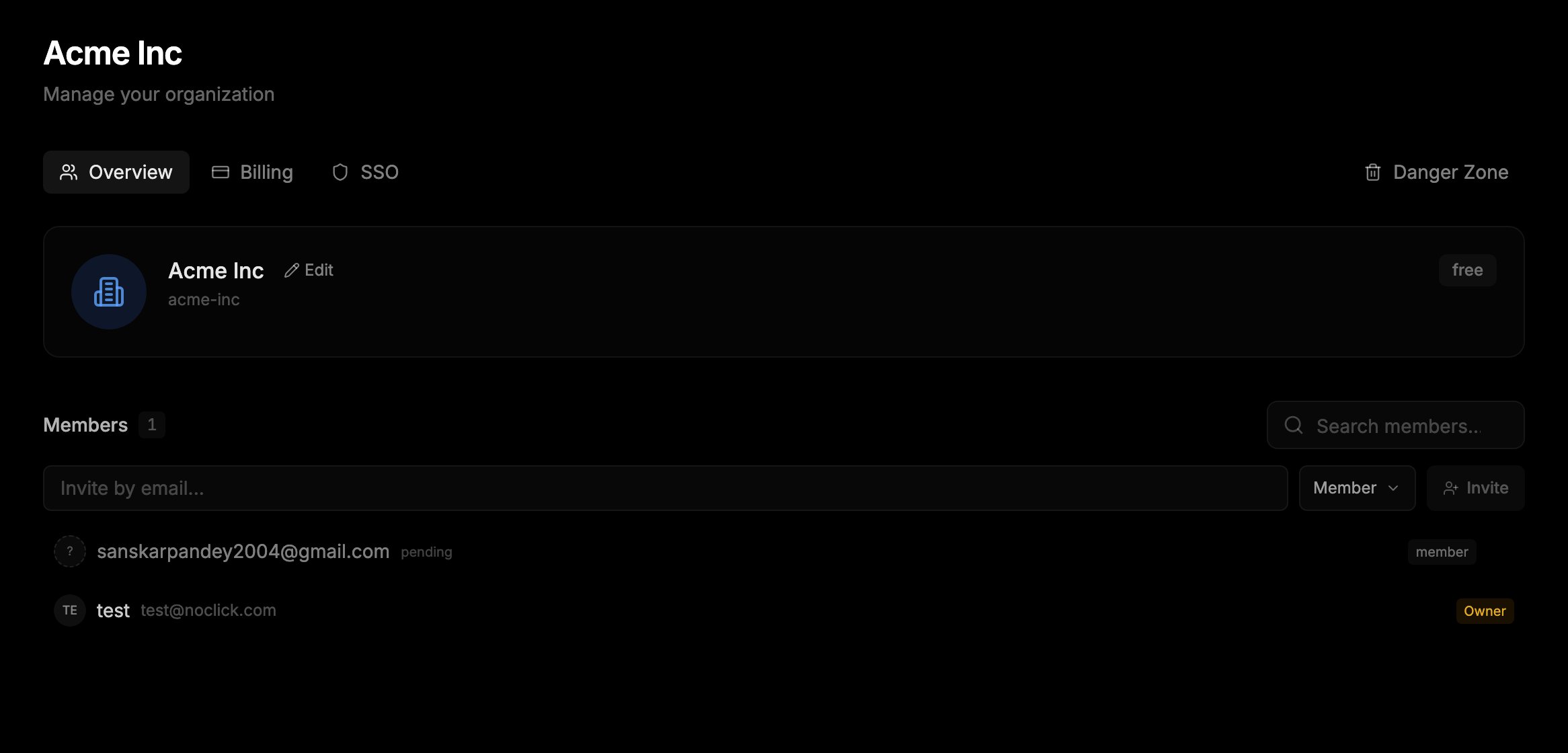 Organization Overview tab showing the invite-by-email field, a pending invite, and members with role badges
