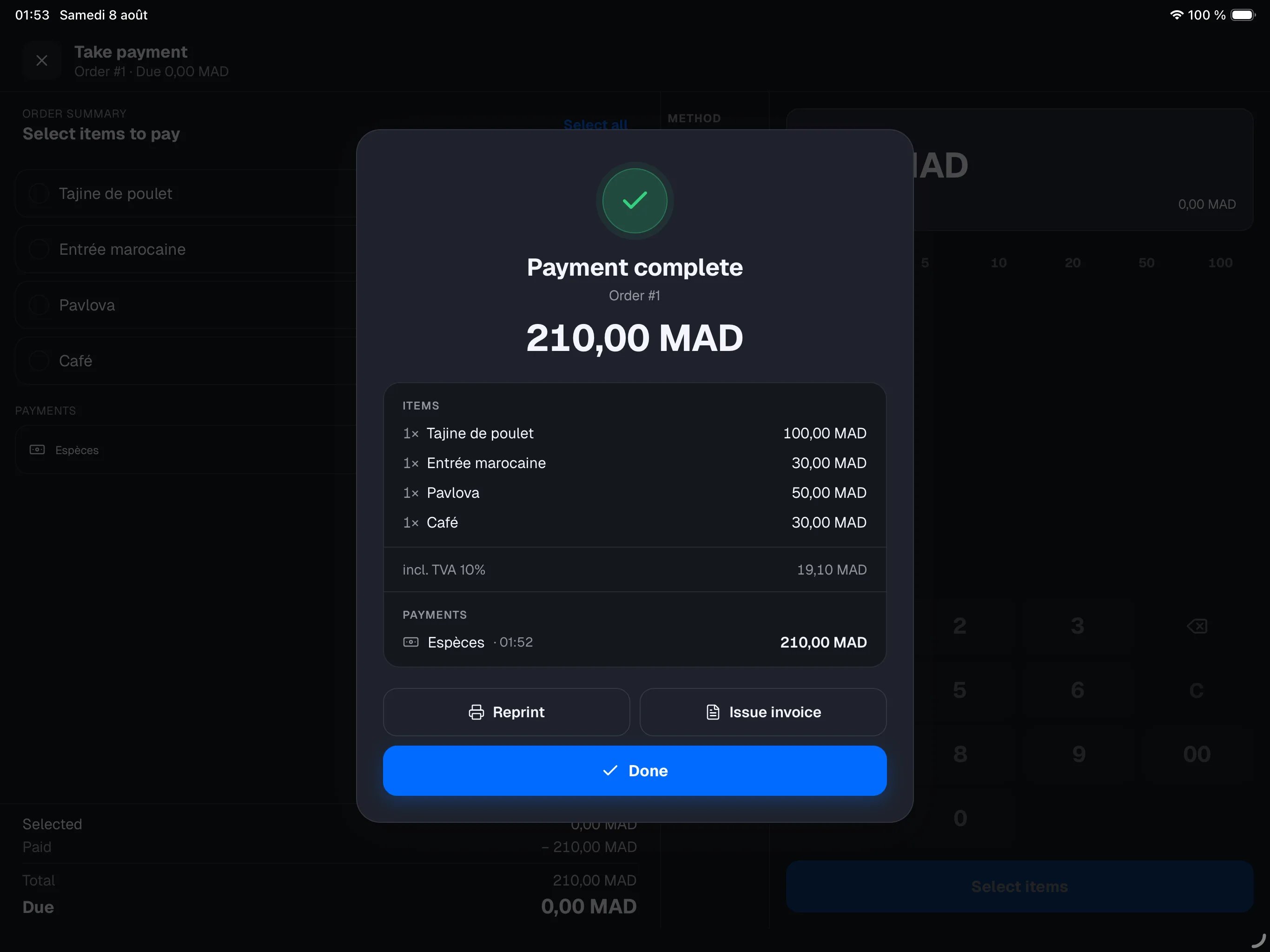 Payment complete screen after taking payment — amount in large type, receipt detail, Reprint / Issue invoice / Done buttons