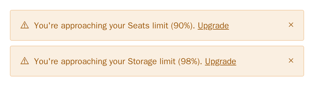 Two UsageAlert warnings for seats at 90% and storage at 98%, minimal theme