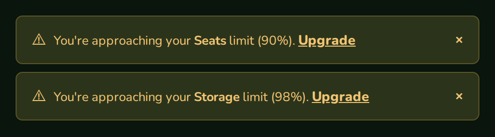 Two UsageAlert warnings for seats at 90% and storage at 98%, nozleDark theme