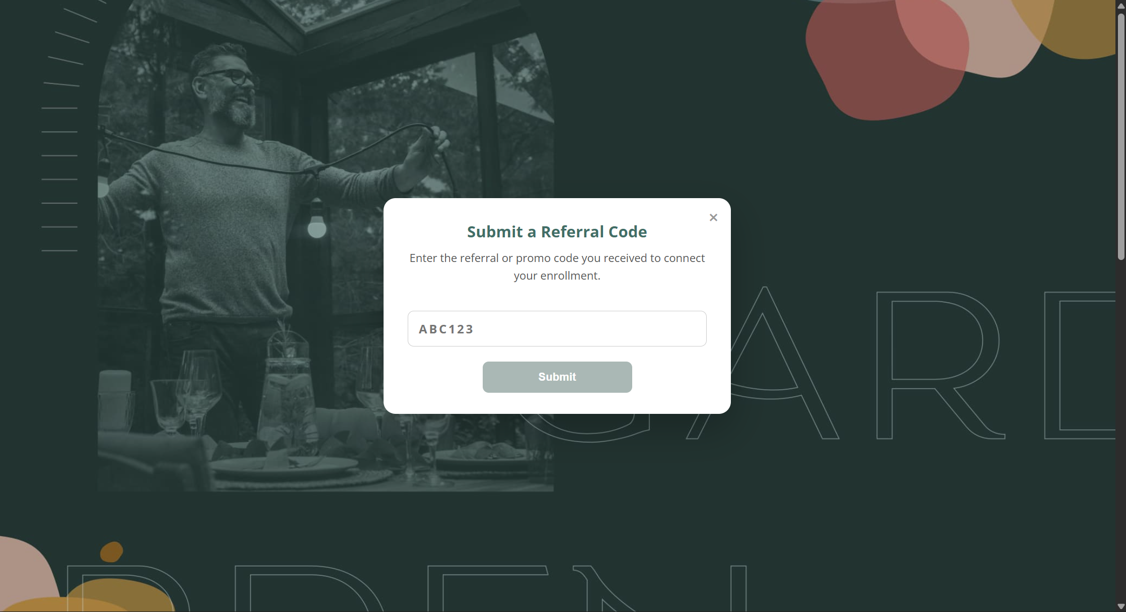 Refer-a-Friend landing page with the Submit a Referral Code modal open, an invalid example code 'ABC123' typed into the input.