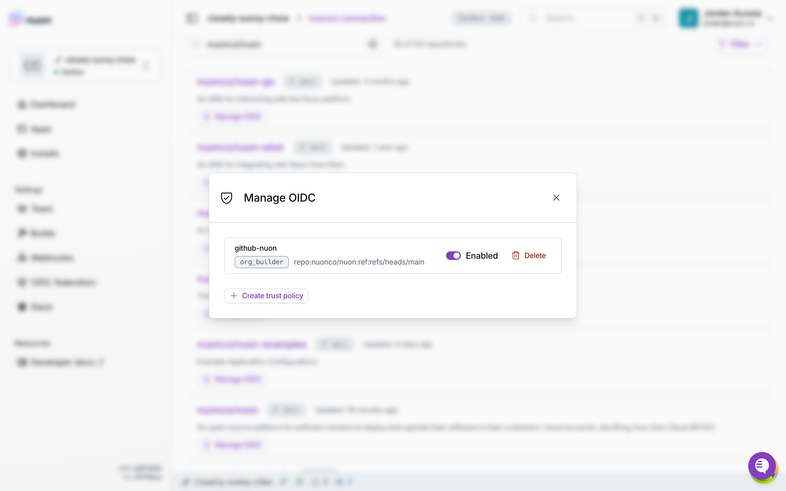 The Manage OIDC modal on a GitHub connection, listing a repository's trust policies with enable and delete controls