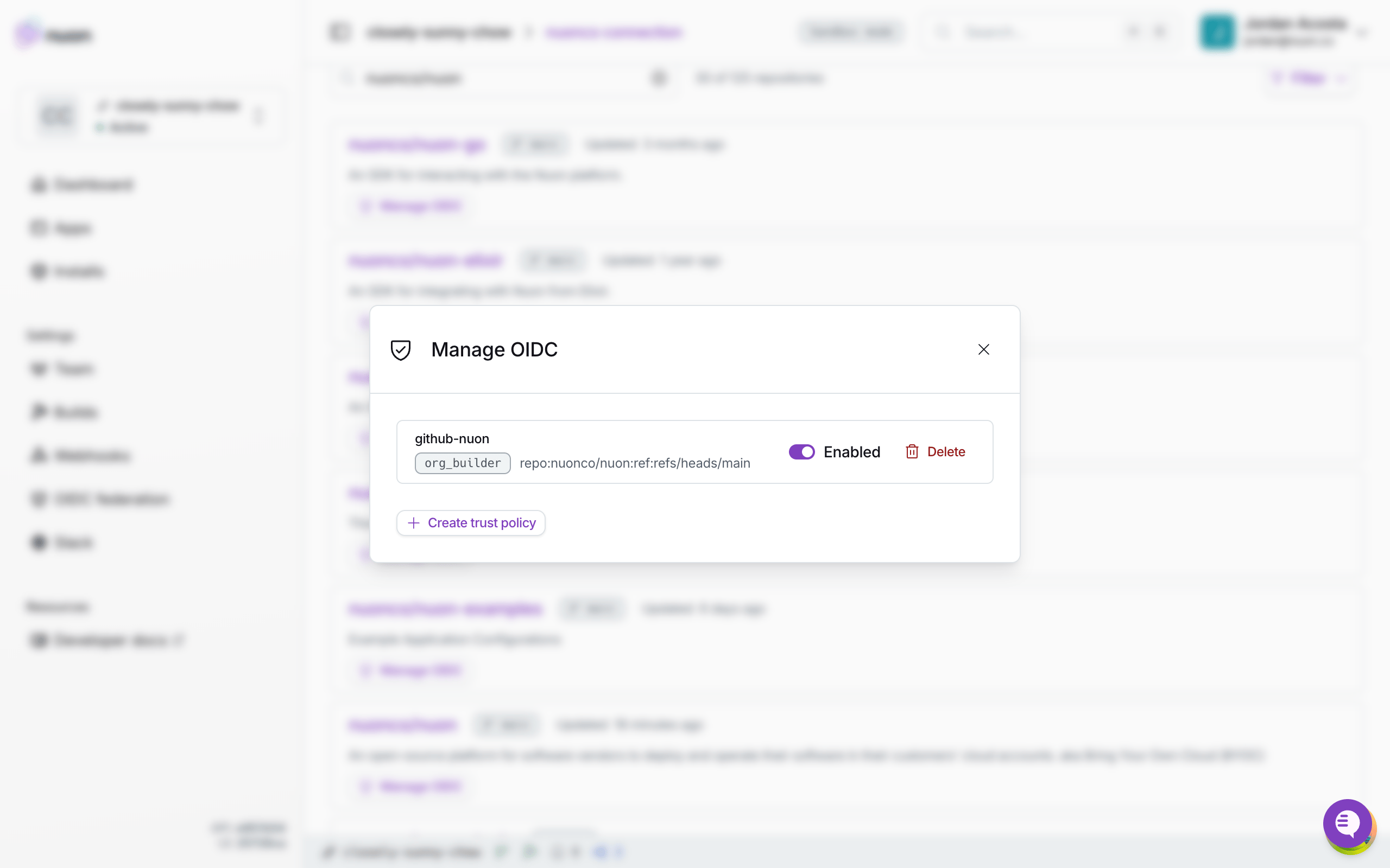 The Manage OIDC modal on a GitHub connection, listing a repository's trust policies with enable and delete controls