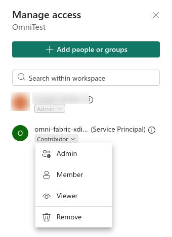 Manage access panel in a Fabric workspace, with the role menu open for a service principal that has the Contributor role