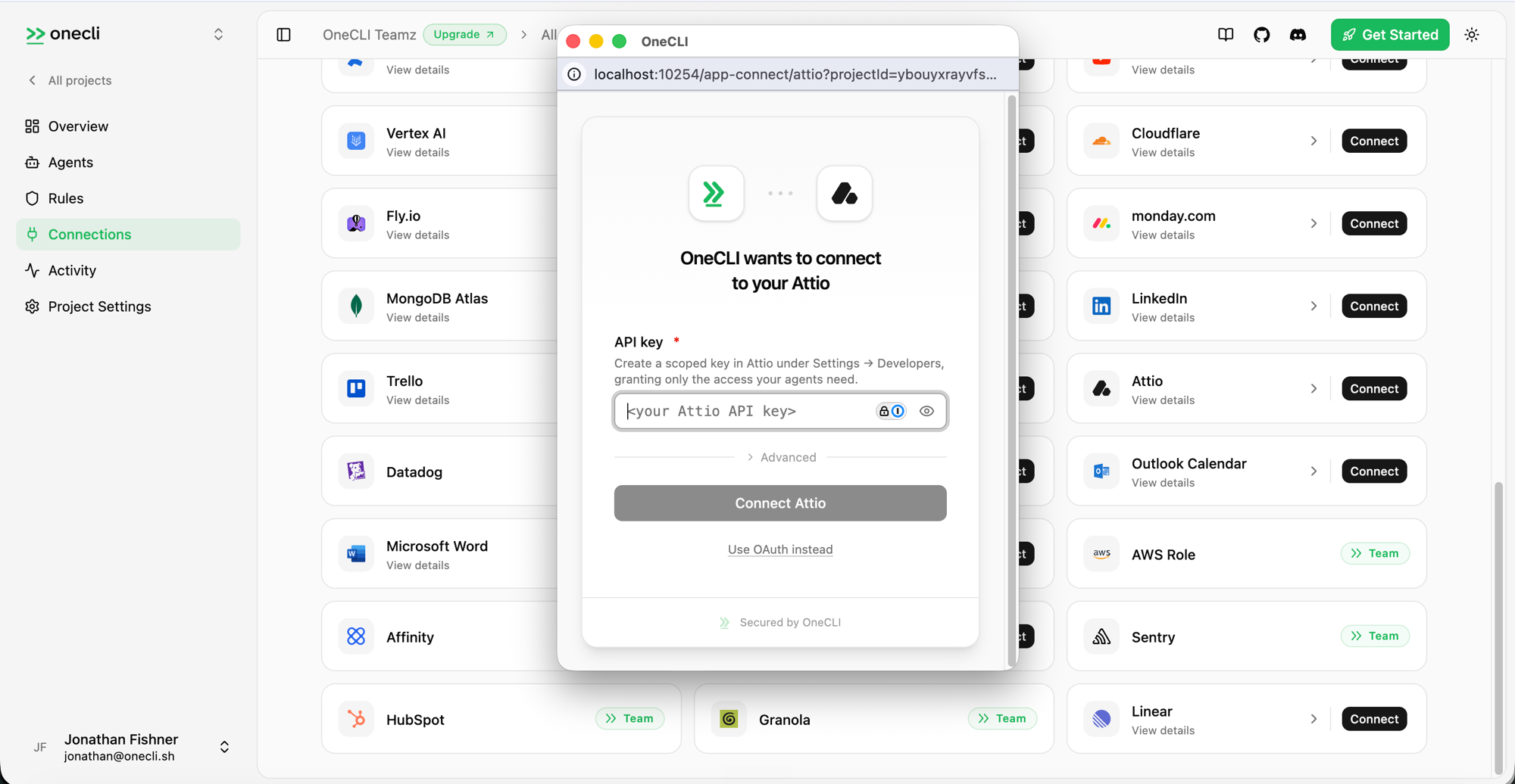 Hogpass connect dialog for Attio with an API key field and a Use OAuth instead option
