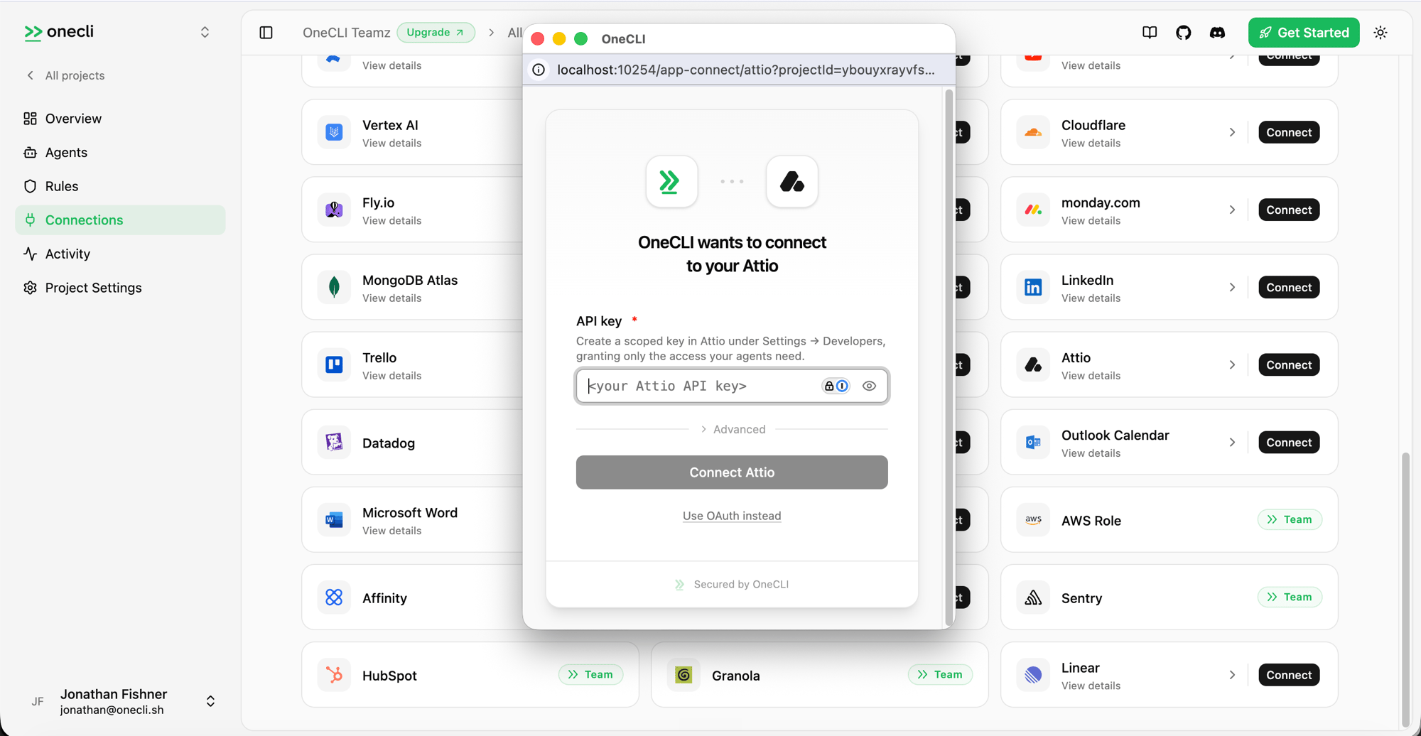 Hogpass connect dialog for Attio with an API key field and a Use OAuth instead option