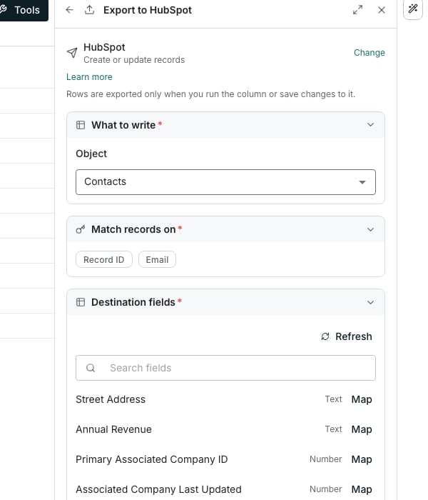 The export editor docked beside a table, showing the chosen destination and its create or update action at the top, a What to write card with Contacts as the object, a Match records on card offering Record ID and Email, and a Destination fields card whose rows each carry the field's type and a Map button.