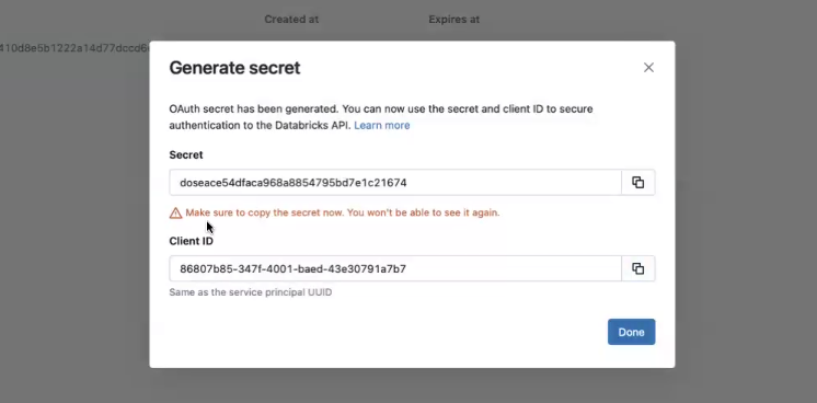 Databricks 'Generate secret' modal showing OAuth secret and client ID for API authentication