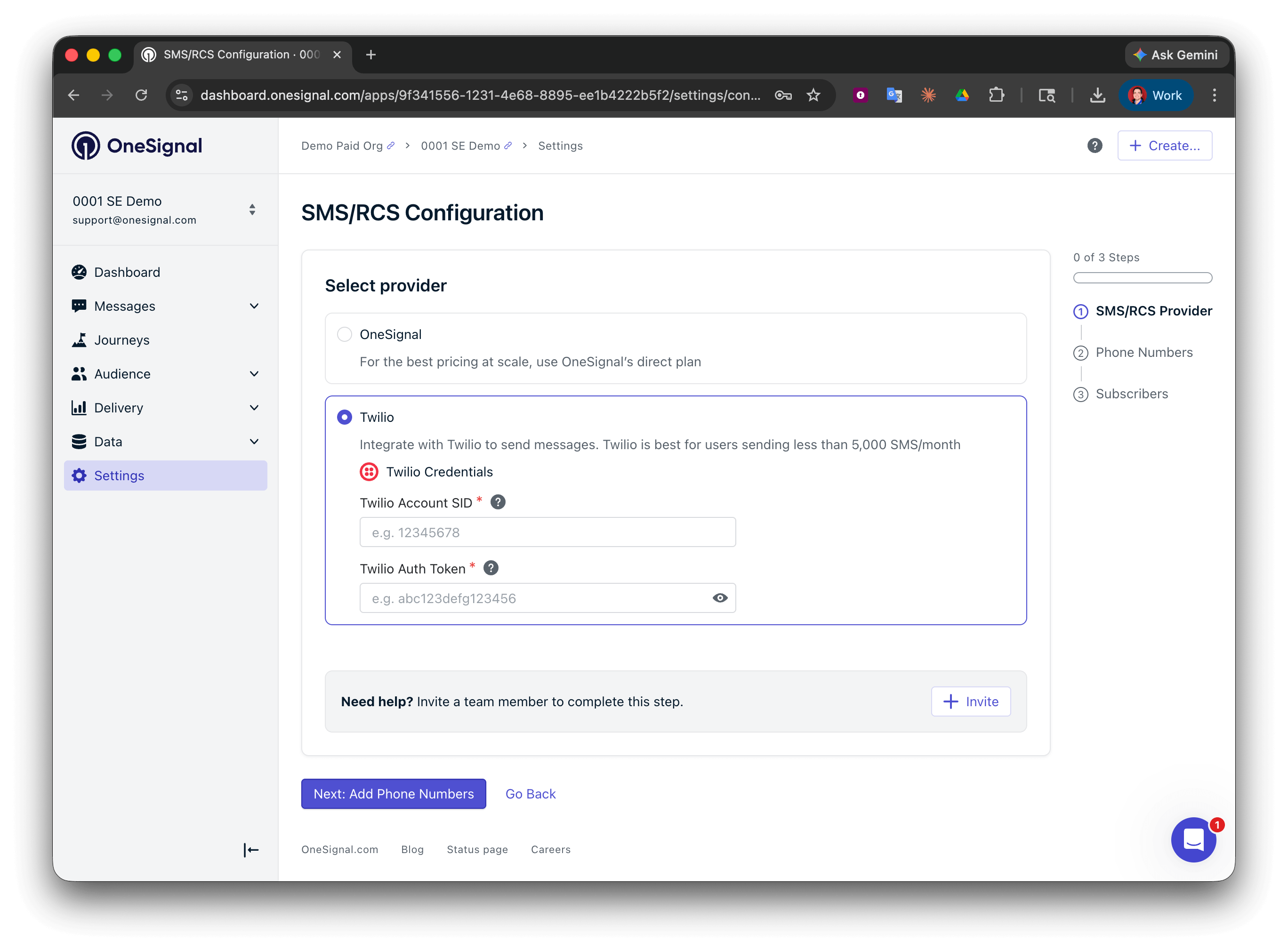 OneSignal SMS configuration screen with Twilio Account SID and Auth Token fields